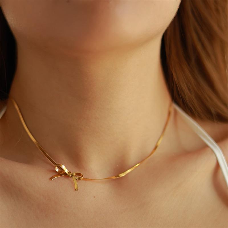 Collar choker moño dorado